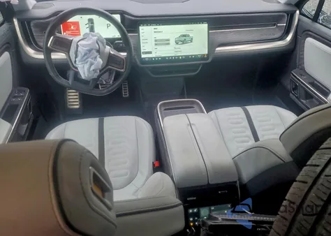 2022 Rivian R1T Adventure from USA, damaged, VIN 7FCTGAAA5NN015927